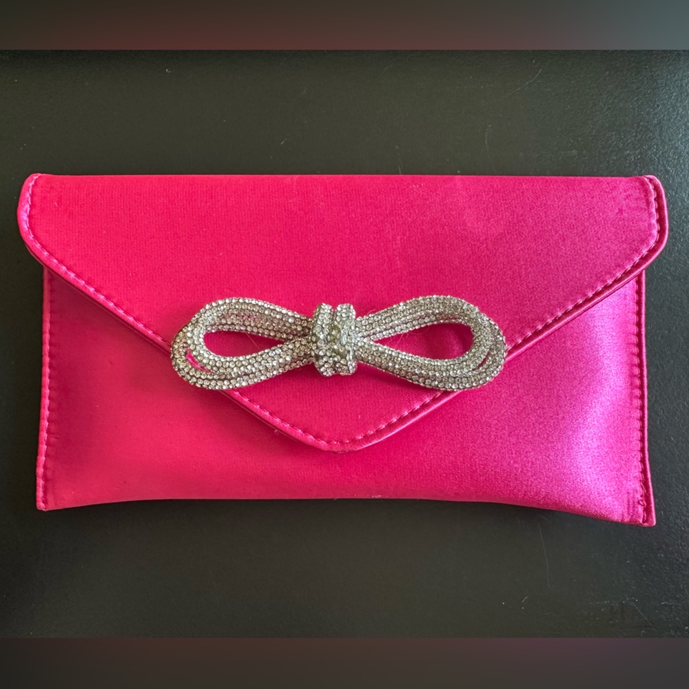 Hot pink with rhinestone bow.